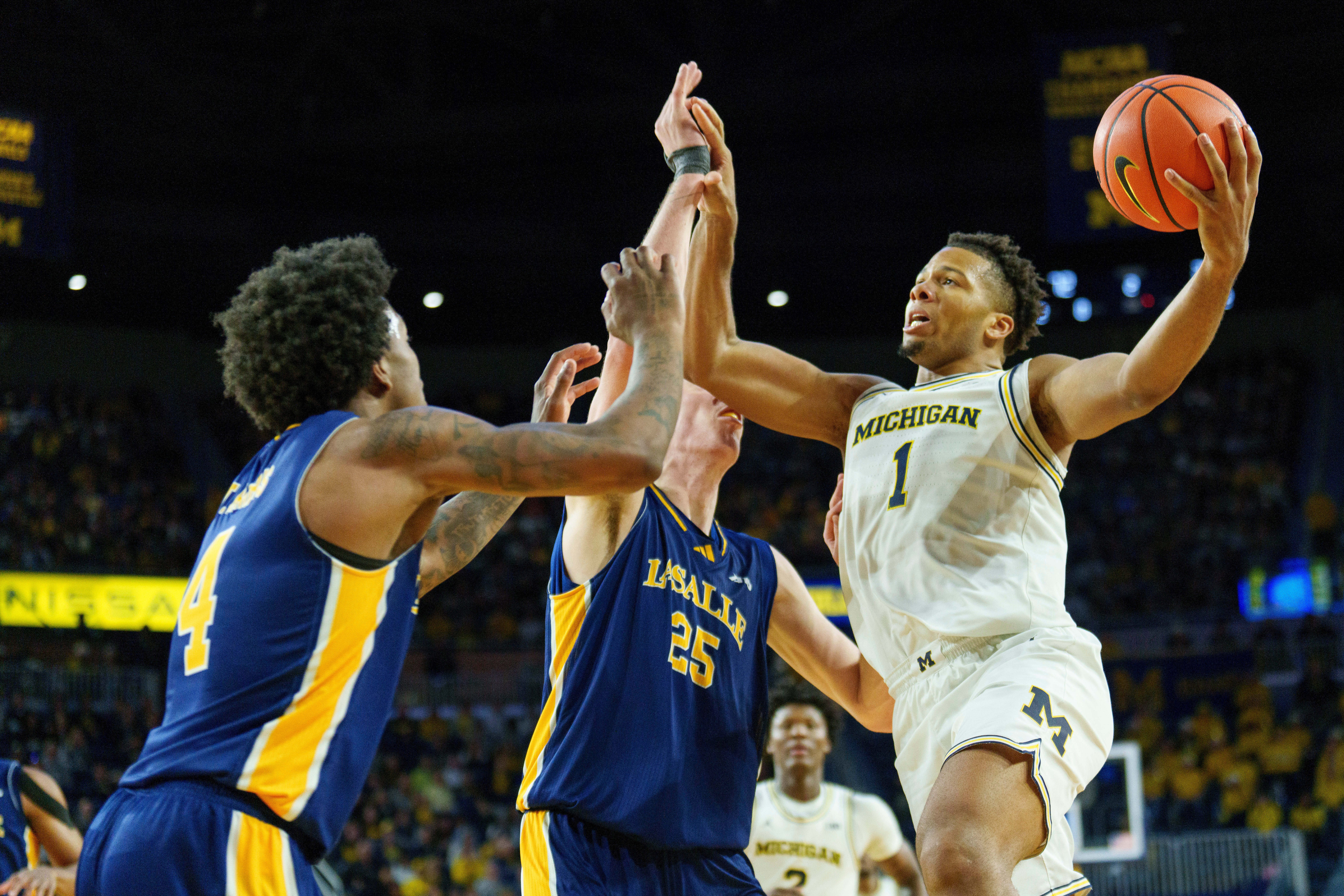 No. 2 Michigan closing gap on No. 1 Arizona in AP Top 25, Duke falls out of top five