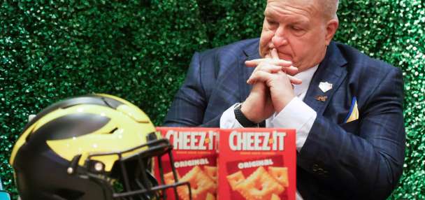 Michigan interim coach Biff Poggi wants to keep the job beyond bowl game and 'fix this program'