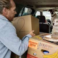 'Glad to fill the gaps': Salt Lake Mission gives boxes of Christmas food to over 200