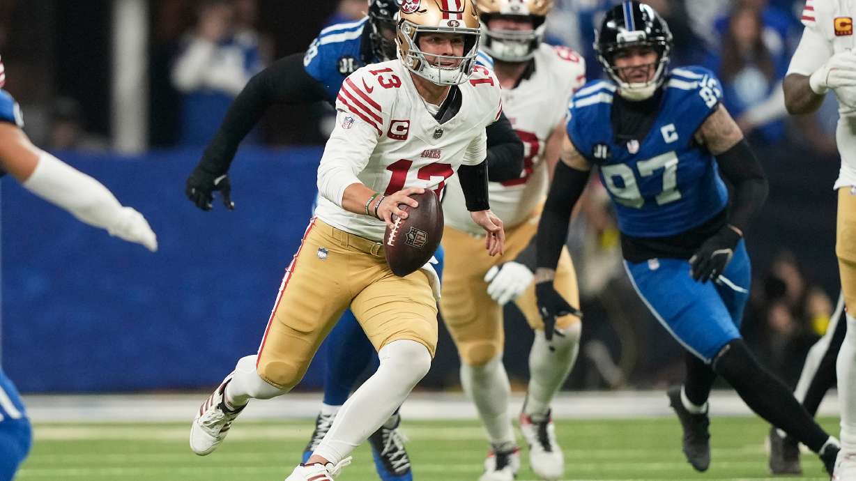 San Francisco 49ers quarterback Brock Purdy (13) runs against the Indianapolis Colts during the first half of an NFL football game, Monday, Dec. 22, 2025, in Indianapolis.
