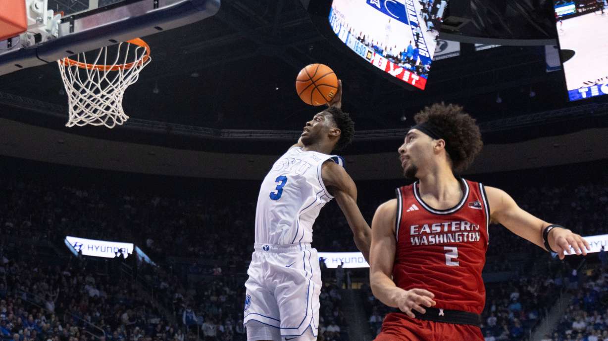 BYU forward AJ Dybantsa (3) prepares to dunk against Eastern Washington guard Isaiah Moses (2) during the first half of an NCAA basketball game, Monday, Dec. 22, 2025, in Provo, Utah.