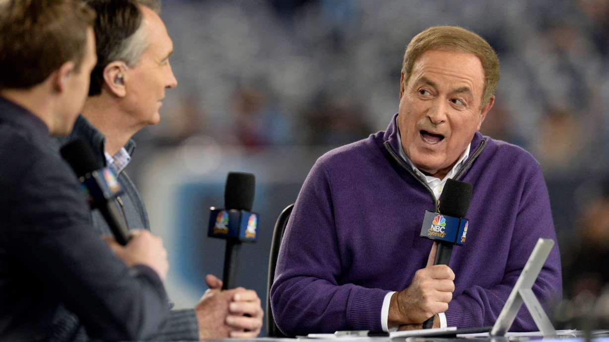 FILE - Al Michaels, right, and Cris Collinsworth, second from left, broadcast from the field before an NFL football game between the Tennessee Titans and the Indianapolis Coltsy, Dec. 30, 2018, in Nashville, Tenn.