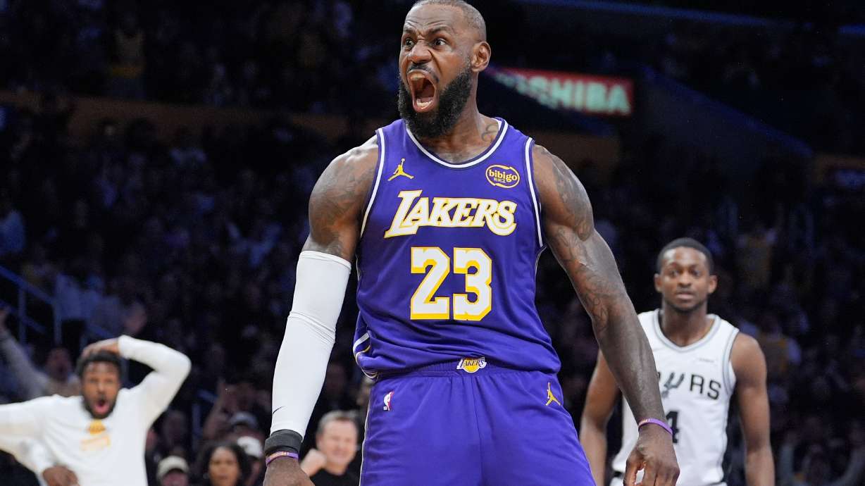 Los Angeles Lakers forward Lebron James (23) reacts after making a dunk during the first half of an NBA Cup basketball game against the San Antonio Spurs Wednesday, Dec. 10, 2025, in Los Angeles.