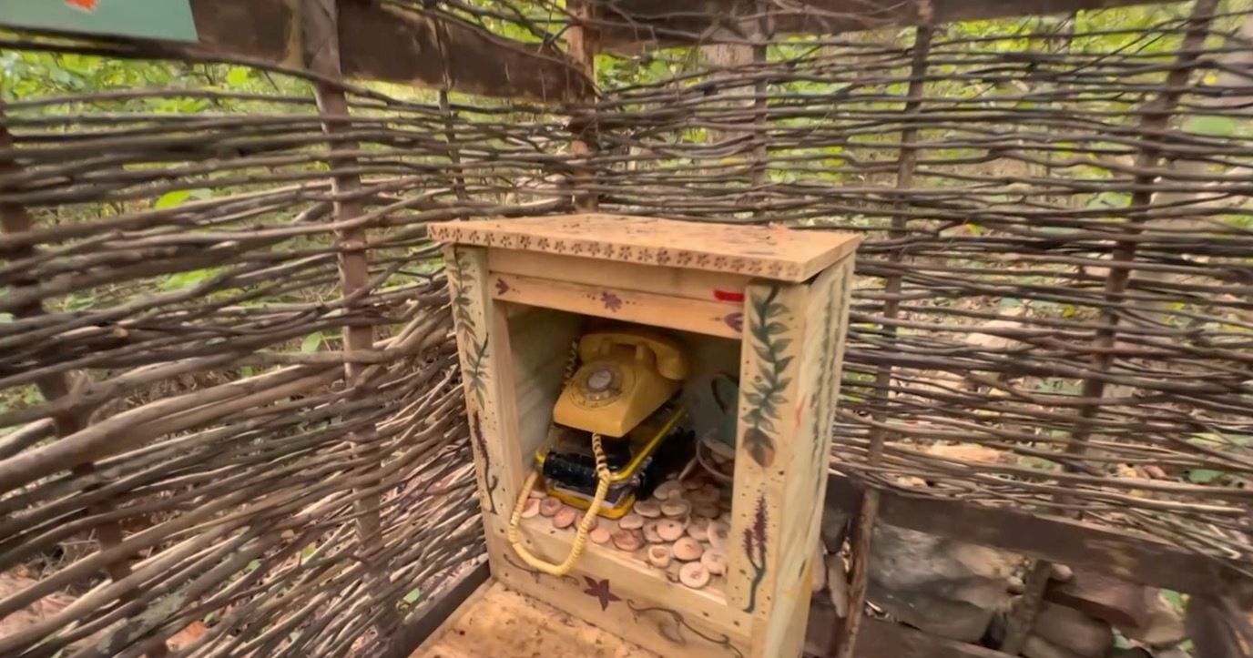 In a corner of Somerset, Massachusetts, there is a sound that seems out of place. A rotary phone in a small wooden structure, allowing the living to connect with those not on the other line, but on the other side.