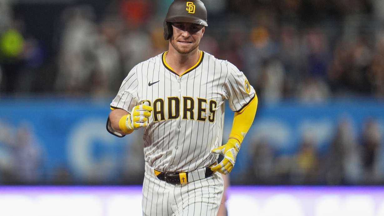 FILE - San Diego Padres' Ryan O'Hearn celebrates after hitting a grand slam during the first inning of a baseball game against the Milwaukee Brewers, Sept. 23, 2025, in San Diego.