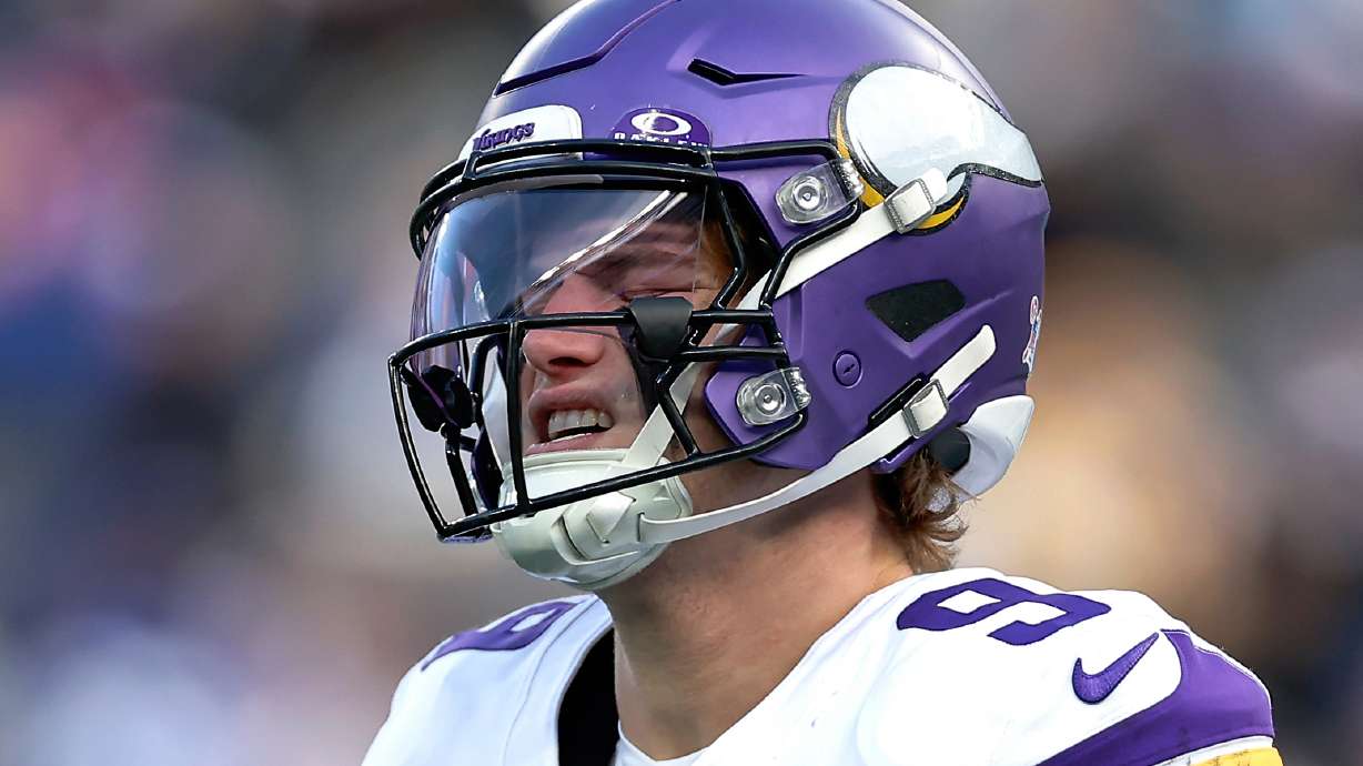 Minnesota Vikings quarterback J.J. McCarthy (9) reacts during the second quarter of an NFL football game against the New York Giants, Sunday, Dec. 21, 2025, in East Rutherford, N.J.