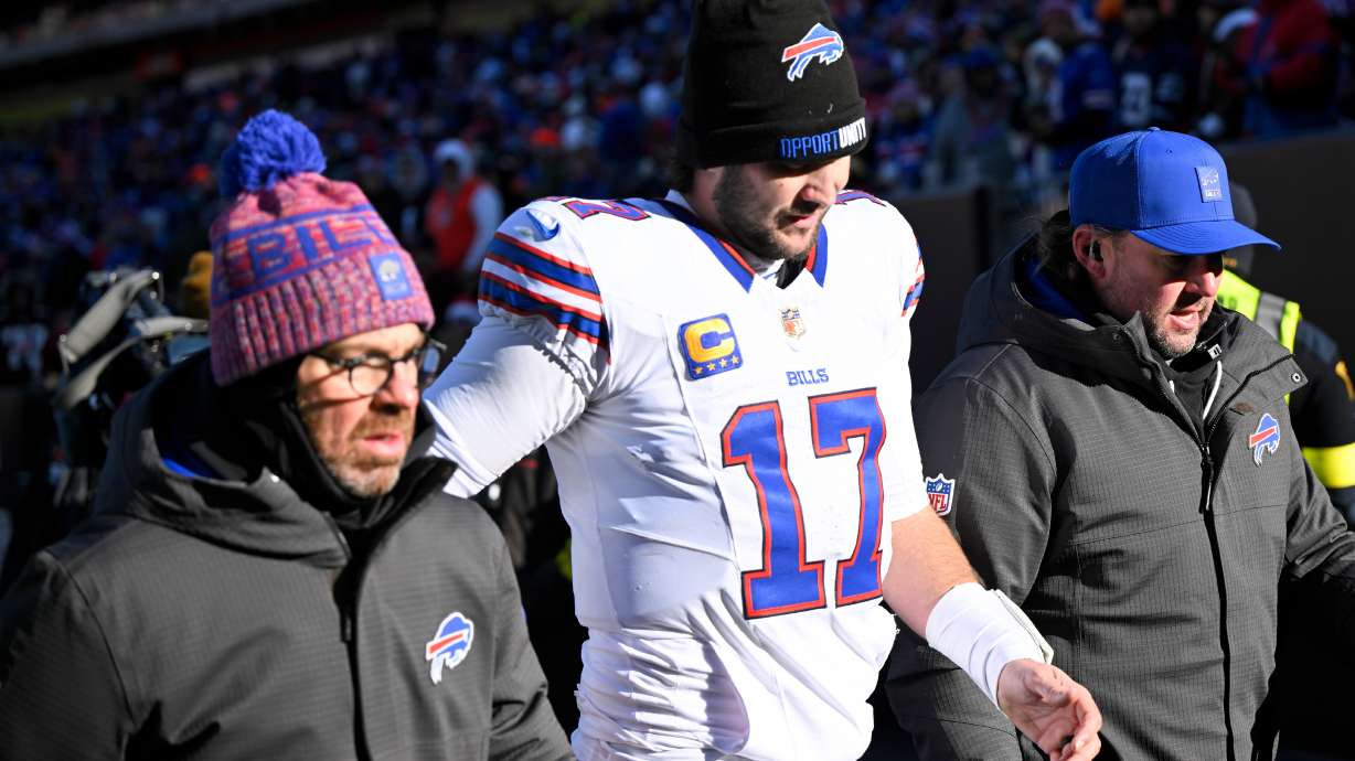 Buffalo Bills quarterback Josh Allen (17) leaves the field after an injury against the Cleveland Browns during the first half of an NFL football game in Cleveland, Sunday, Dec. 21, 2025.