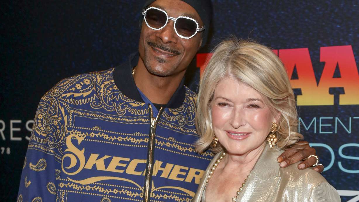 FILE - Snoop Dogg, left, and Martha Stewart attend the Footwear News Achievement Awards at Cipriani South Street on Wednesday, Nov. 29, 2023, in New York.