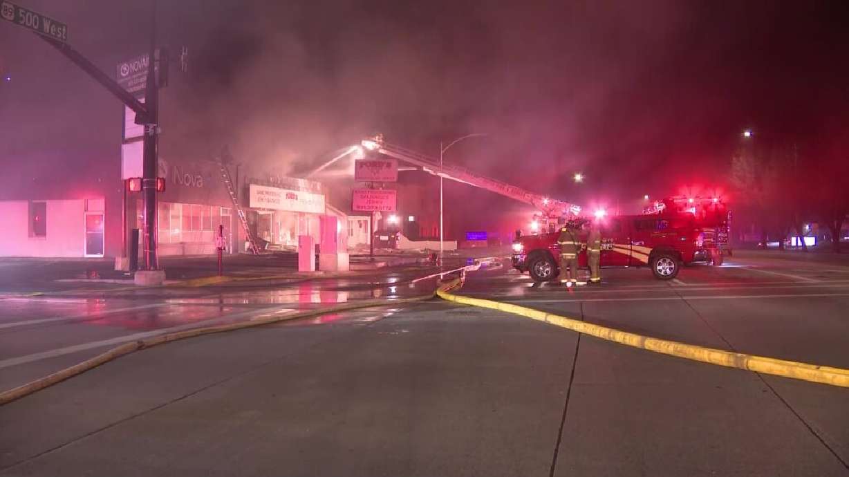 Firefighters at the scene of a fire in Provo on Dec. 16 that damaged two businesses. Ford's Locker, one of the businesses, now faces uncertainty as its owners said the store is a total loss.