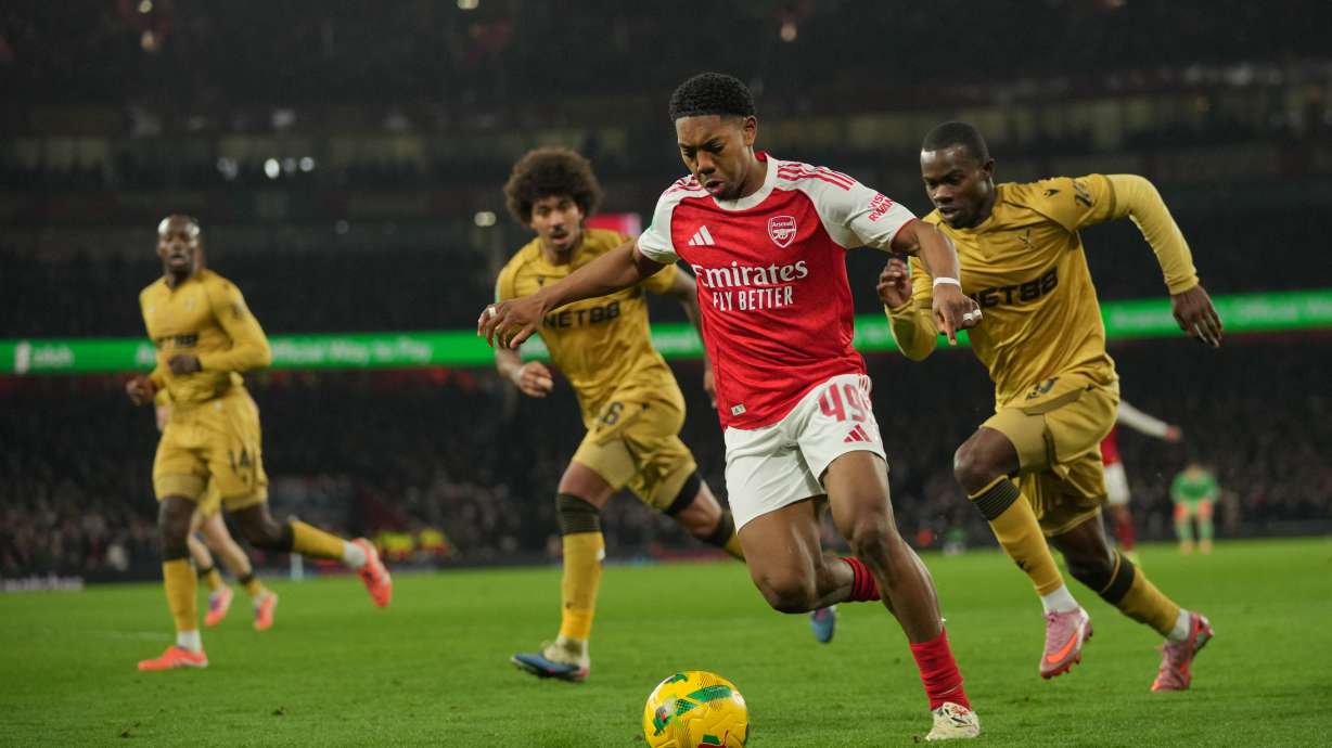 Arsenal's Myles Lewis-Skelly in action during the English Football League Cup quarter-final soccer match between Arsenal and Crystal Palace in London, Tuesday, Dec. 23, 2025.