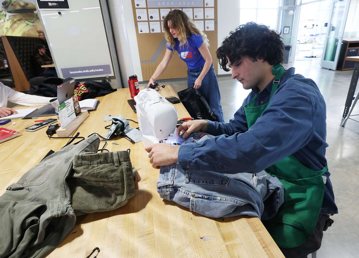 Student Shea Markoff sews pants at the University of Utah’s Lassonde Studio in Salt Lake City on Nov. 20, 2024.