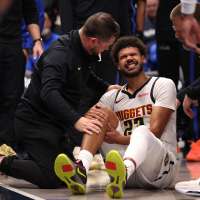Nuggets forward Cameron Johnson avoids major knee injury but will miss a few games, AP source says