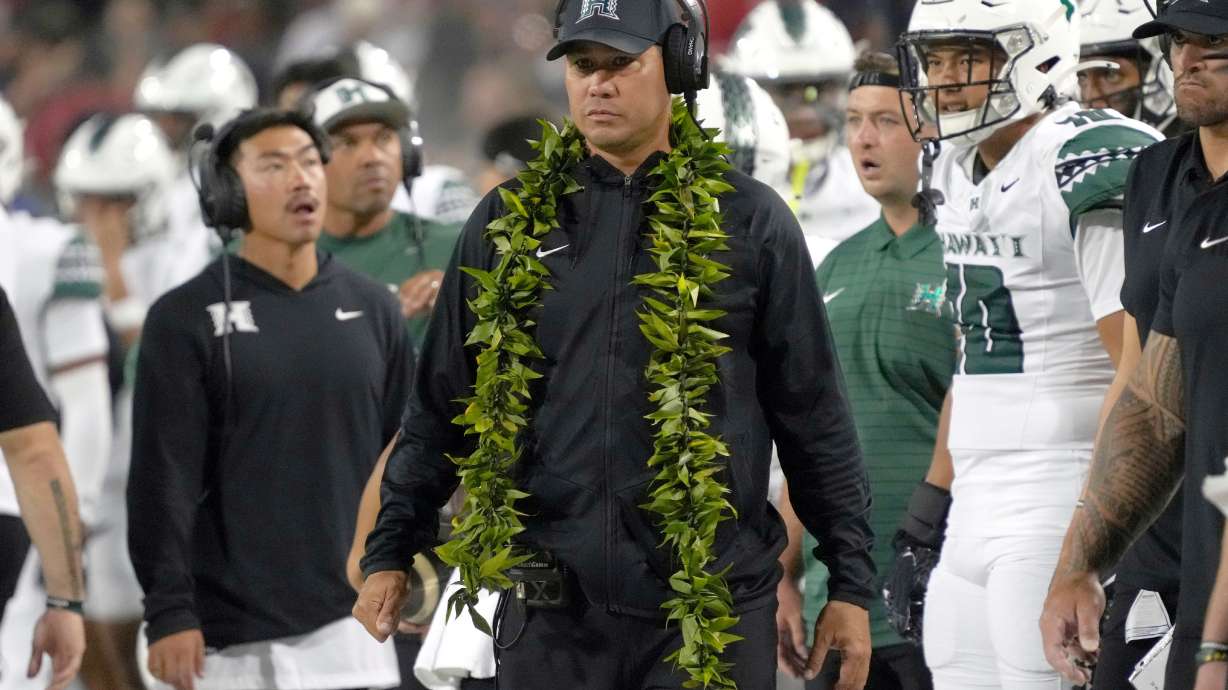 FILE - Hawaii head coach Timmy Chang in the first half during an NCAA football game against Arizona on Saturday, Aug. 30, 2025, in Tucson, Ariz.