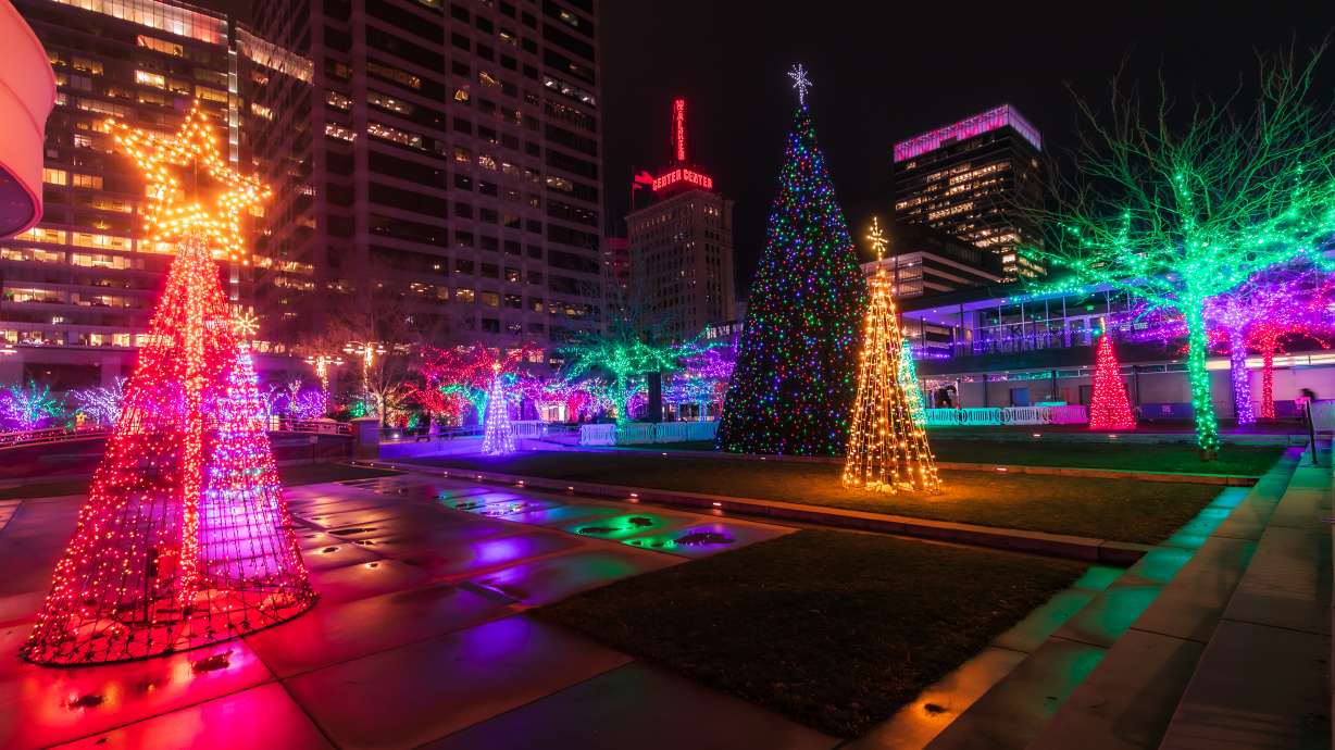 Christmas lights light up downtown Salt Lake City on Wednesday night. Salt Lake City matched its warmest Christmas on record on Thursday, but a mix of rain and snow is forecast for the state this weekend.