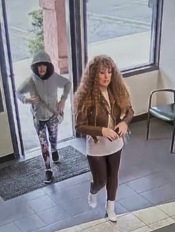 Ashlee and Melodee Buzzard are shown in a surveillance video where investigators believe they are wearing wigs.