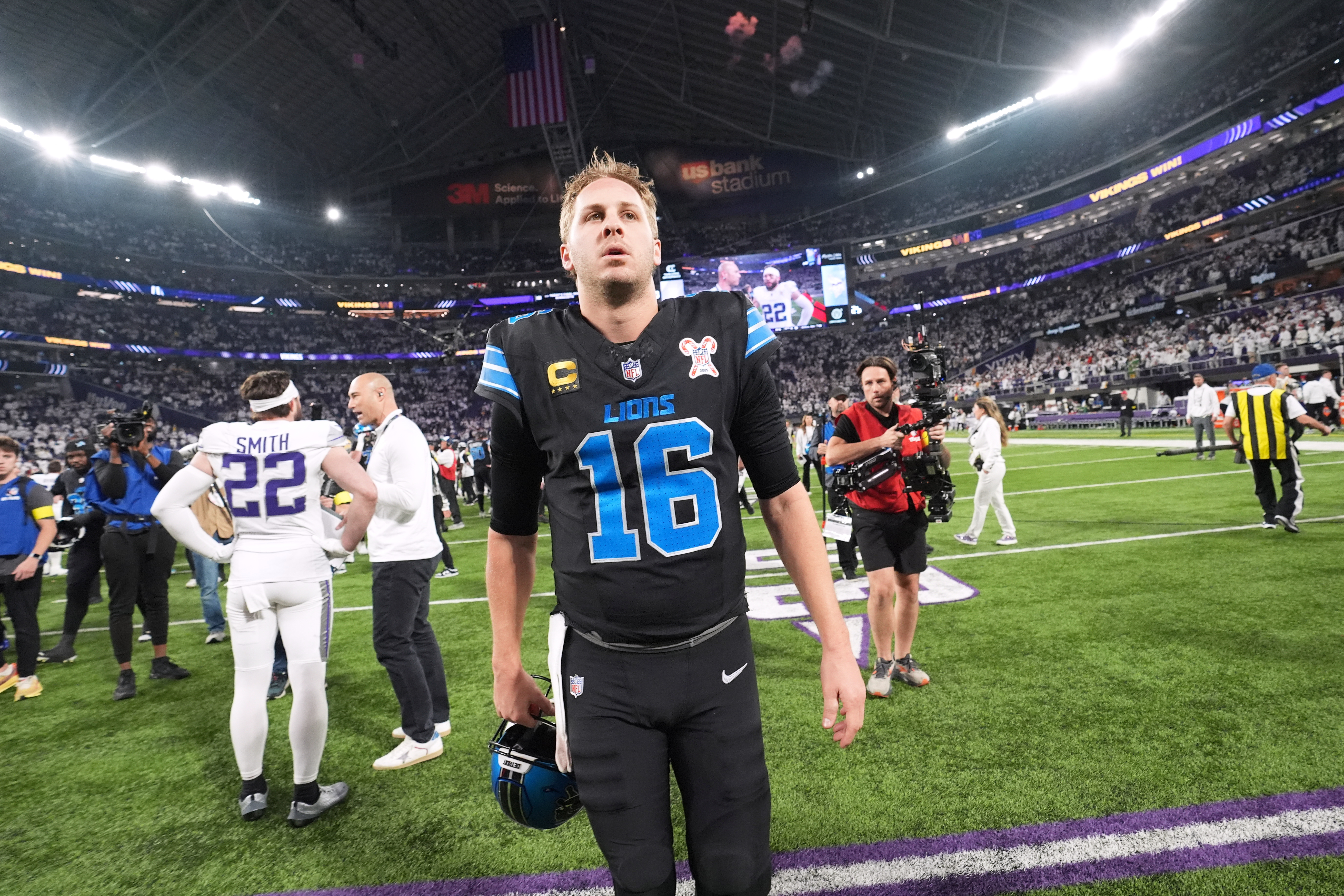 Detroit Lions quarterback Jared Goff walks off the field after the team's loss to the Minnesota Vikings in an NFL football game, Thursday, Dec. 25, 2025, in Minneapolis.