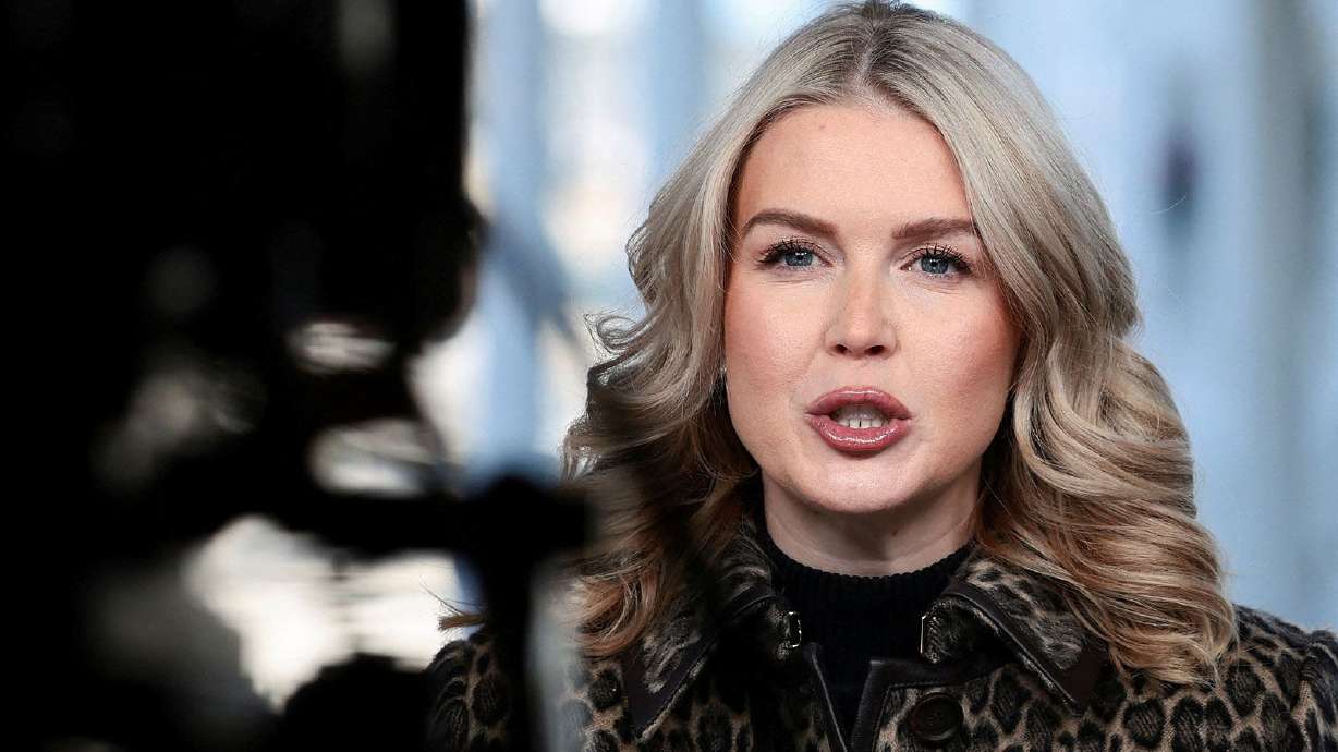 White House Press Secretary Karoline Leavitt is interviewed by Fox News outside the White House. She announced Friday that she and her husband are expecting their second child in May of next year.