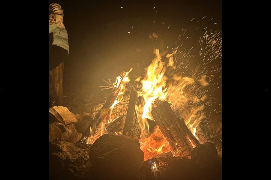 A bonfire lit up the night sky in Arbon Valley as the Fitch Family gathered to celebrate Christmas, roasting marshmallows and singing Christmas carols.