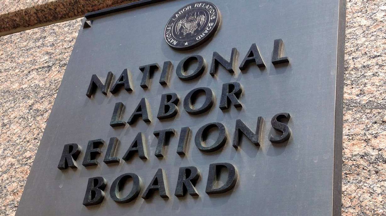 The sign for the National Labor Relations Board is seen on the building that houses their headquarters in downtown Washington, July 17, 2013.