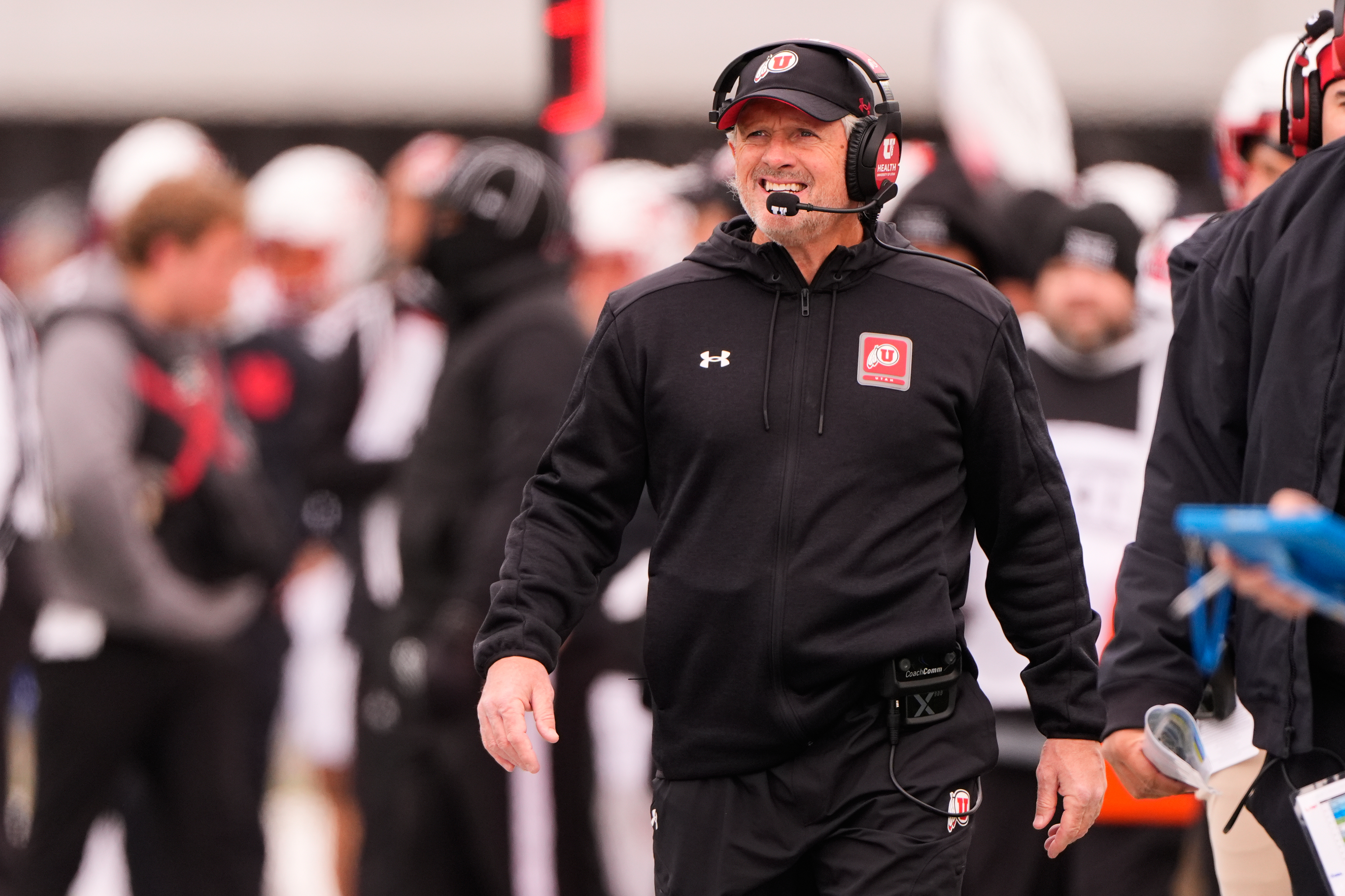 Utah head coach Kyle Whittingham watches during the first half of an NCAA college football game against Kansas, Friday, Nov. 28, 2025, in Lawrence, Kan.
