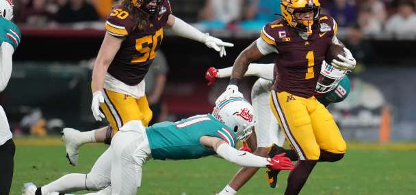 Smith's diving TD catch in overtime sends Minnesota to 20-17 win over New Mexico in Rate Bowl