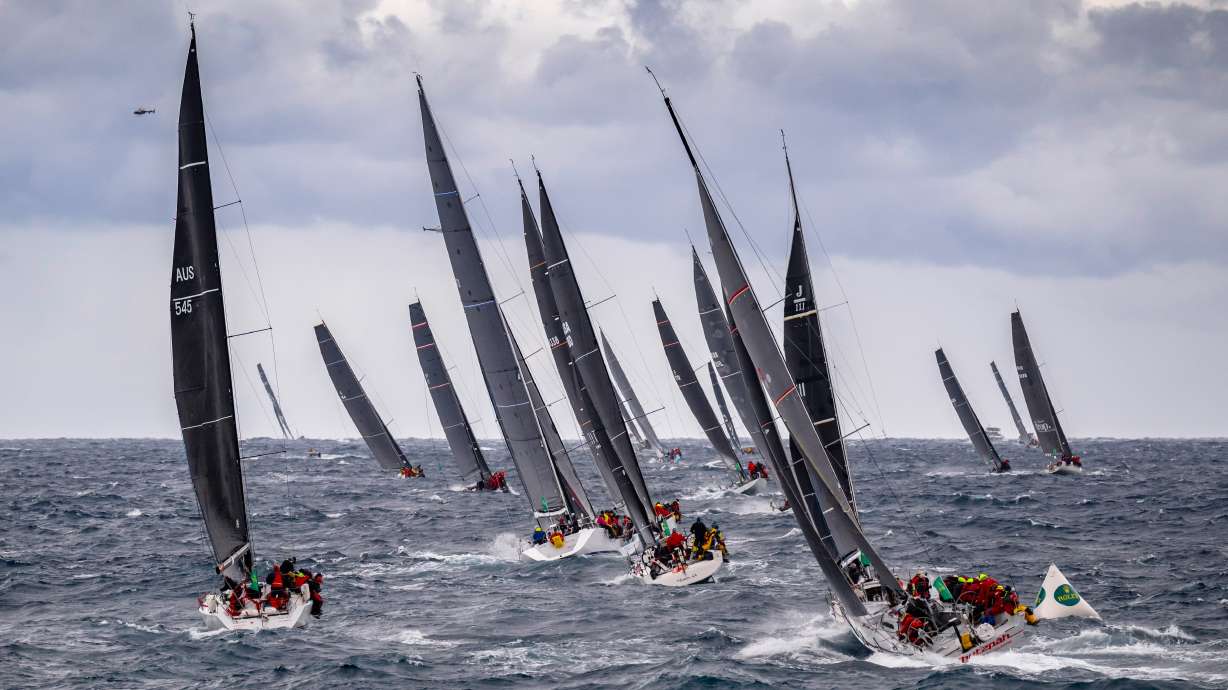 In this photo provided by the Cruising Yacht Club of Australia, competitors make a start in the Sydney Hobart yacht race in Sydney, Friday, Dec. 26, 2025.