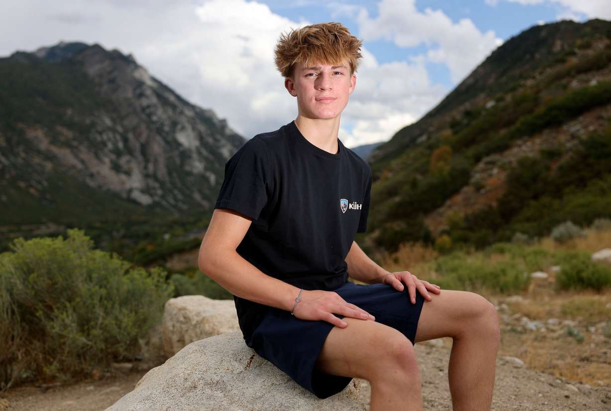 Jesse Zurinskas, 15, poses for a photo at the Bells Canyon Preservation trailhead in Sandy on Aug. 25, 2025. Zurinskas holds the record for the youngest person to complete the Wasatch Ultimate Ridge Linkup, which is around 36 miles and 20,000 feet of elevation gain.