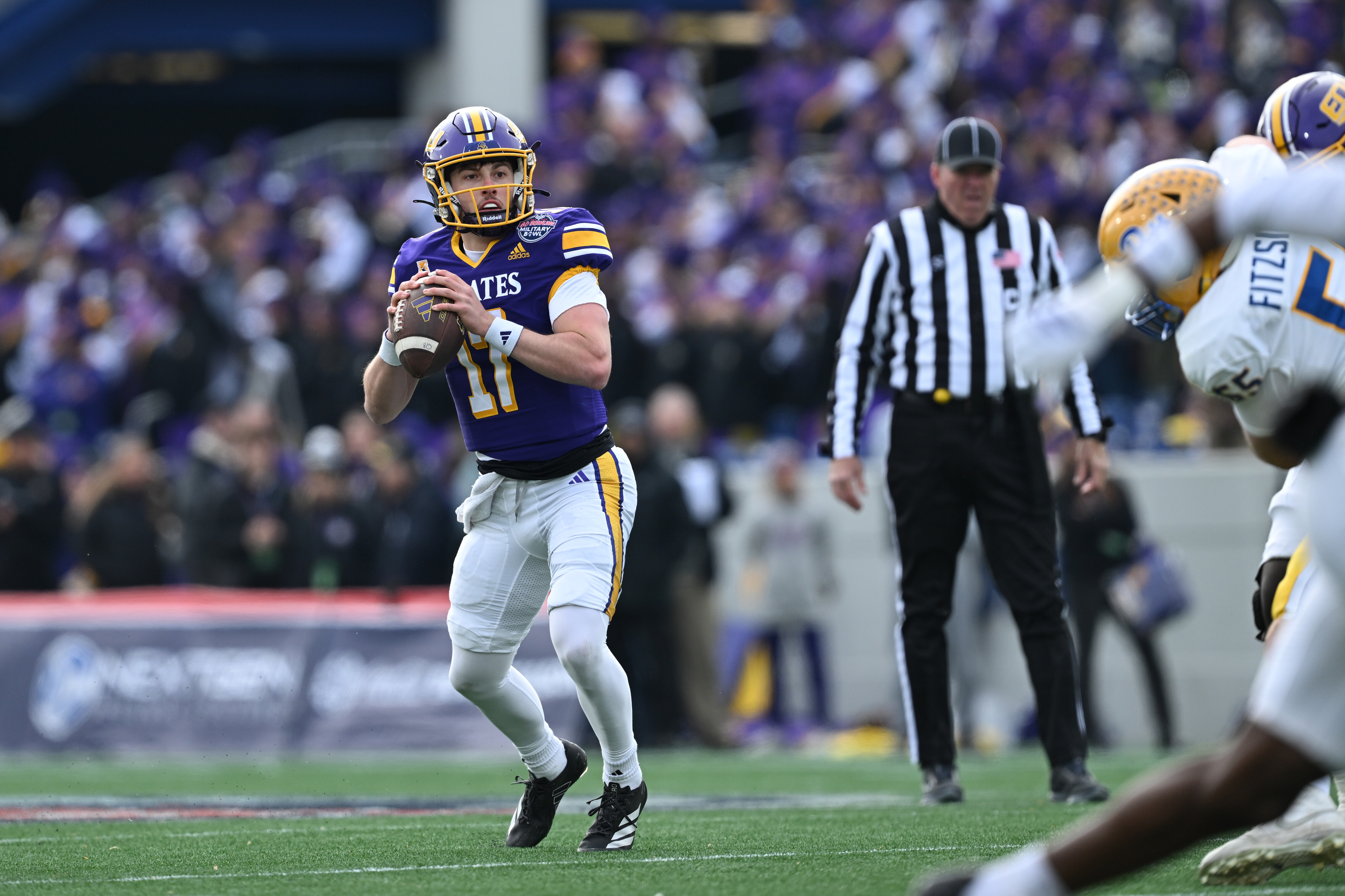 East Carolina quarterback Chaston Ditta (17) looks to pass during the first half of the Military Bowl NCAA college football game, Saturday, Dec. 27, 2025, in Annapolis, Md.