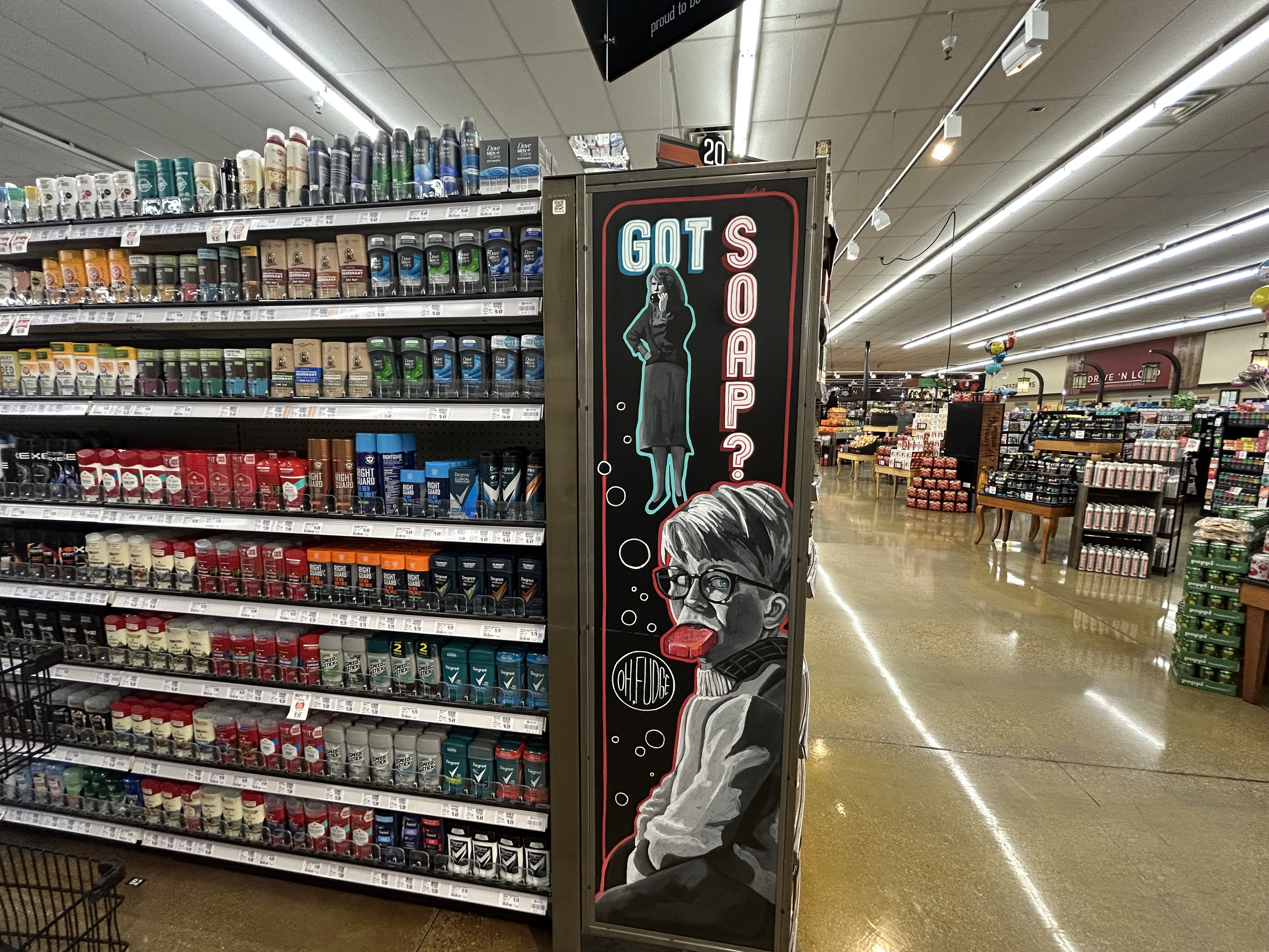 A soap aisle sign created by Harmons artist Kirsten Beitler.