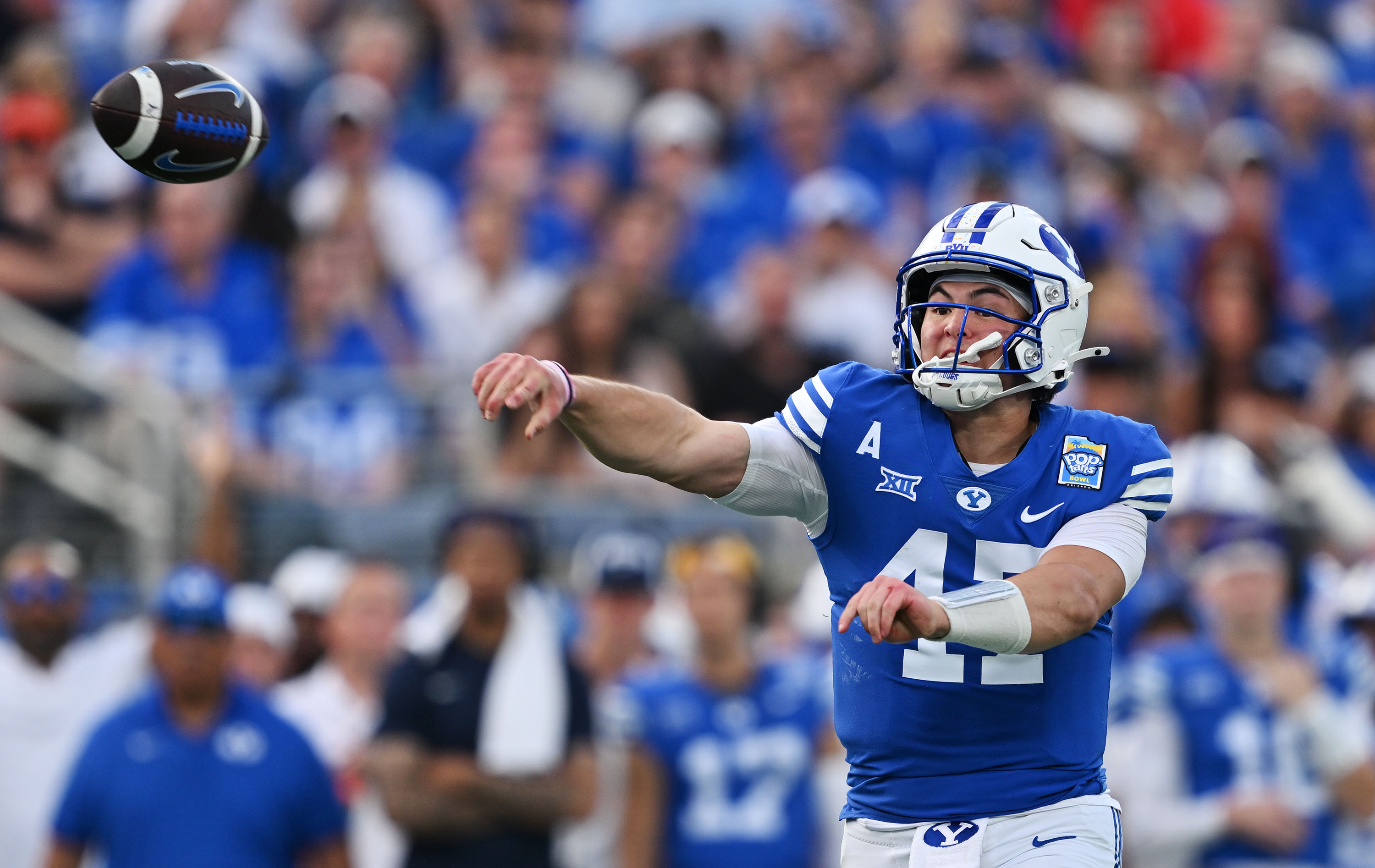 BYU Cougars quarterback Bear Bachmeier (47) passes the ball as the Cougars and the Yellow Jackets play in the Pop Tarts Bowl  in Orlando on Saturday, Dec. 27, 2025.