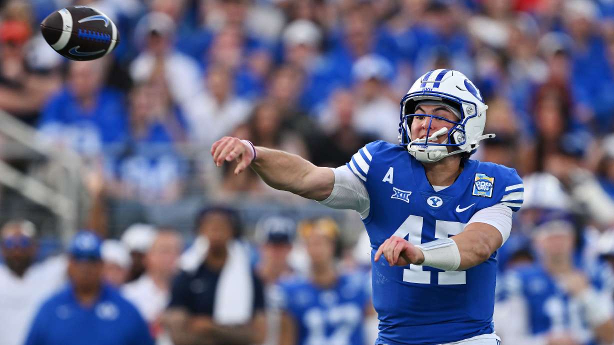 BYU Cougars quarterback Bear Bachmeier (47) passes the ball as the Cougars and the Yellow Jackets play in the Pop Tarts Bowl in Orlando on Saturday, Dec. 27, 2025.