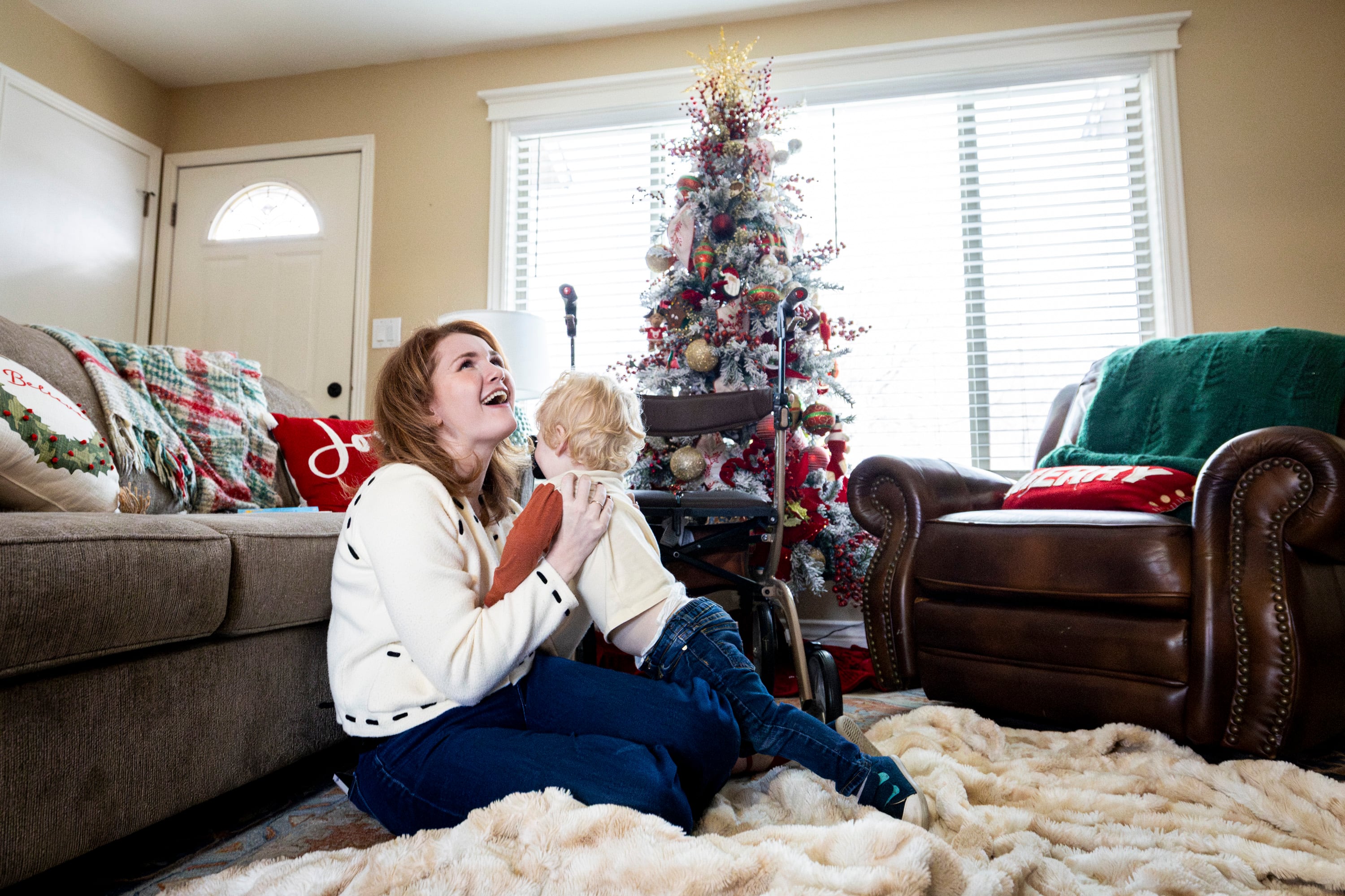 Tiffany Fransen holds her son, Andy, 1, after he ran into her arms at her family's home in Highland on Dec. 17.