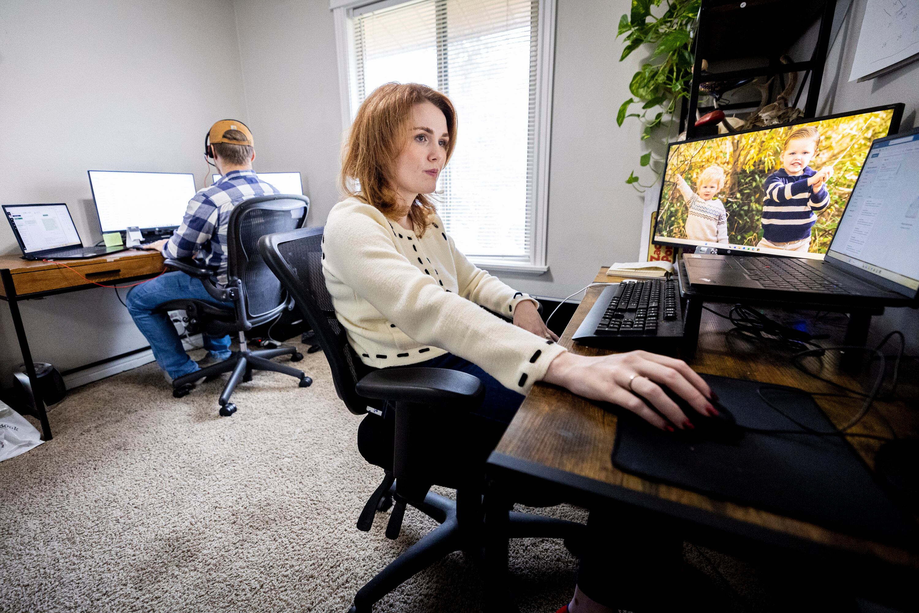 Tiffany Fransen and her husband, Alex, both work from home in their office at their  family's home in Highland on Dec. 17.