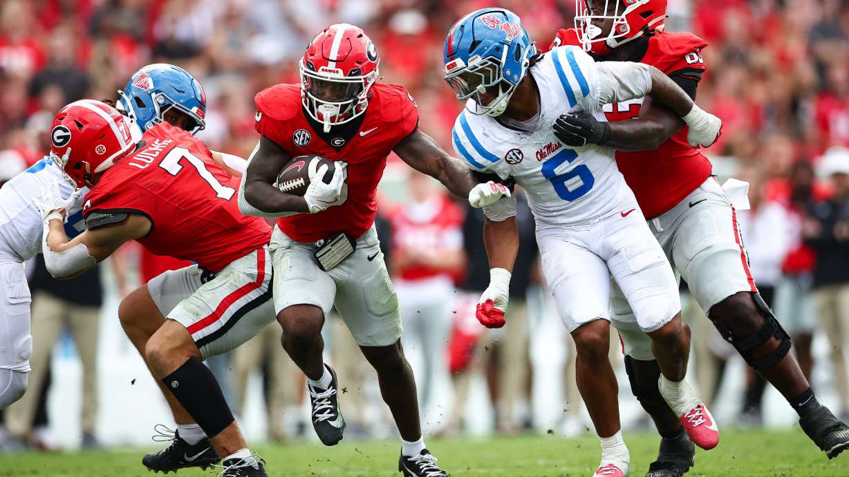 FILE - Georgia running back Nate Frazier (3) runs with the ball during the first half of an NCAA college football game against Mississippi, Saturday, Oct. 18, 2025, in Athens, Ga.