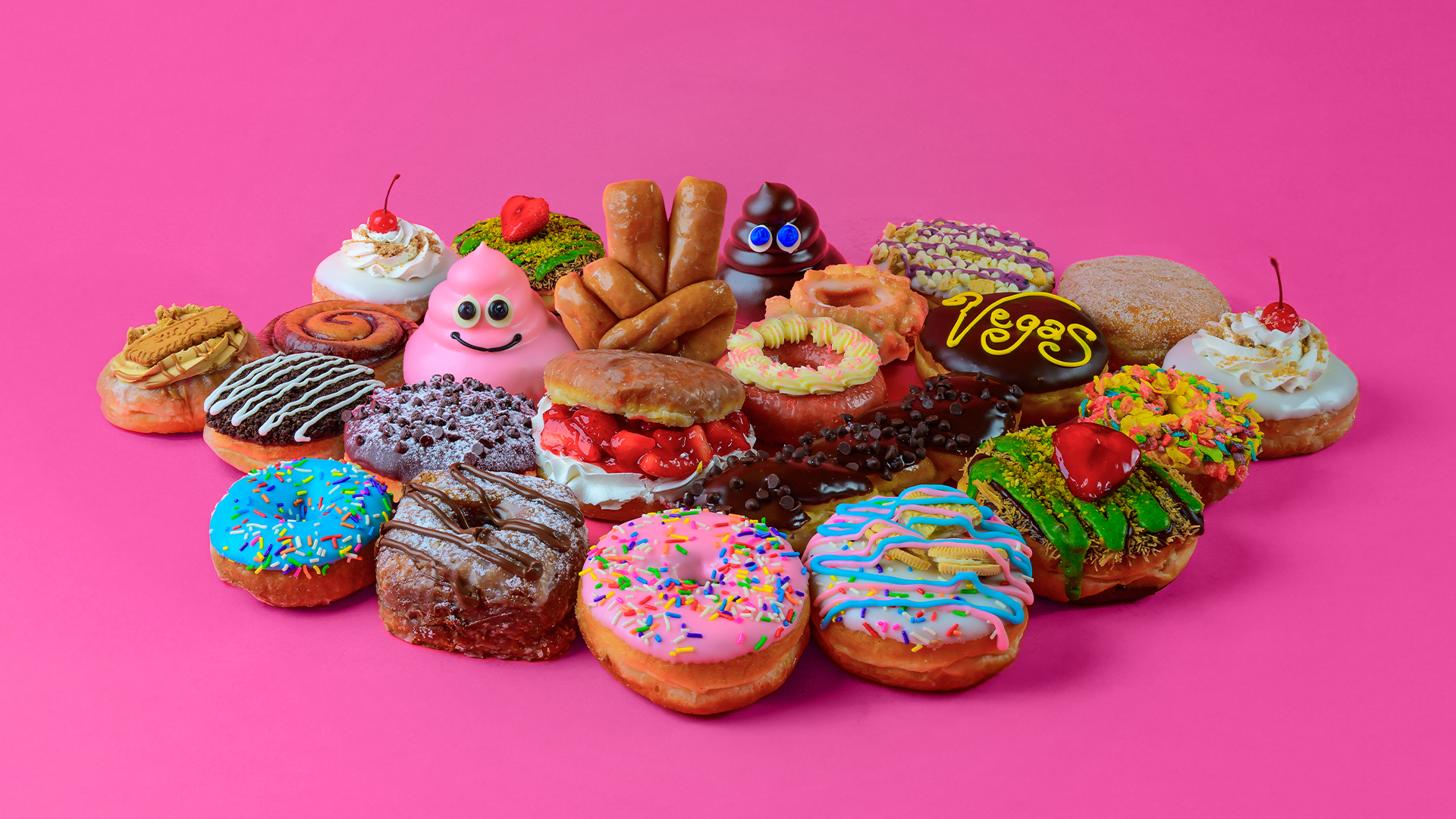 A collection of decorated Pinkbox Doughnuts is shown in an undated image.