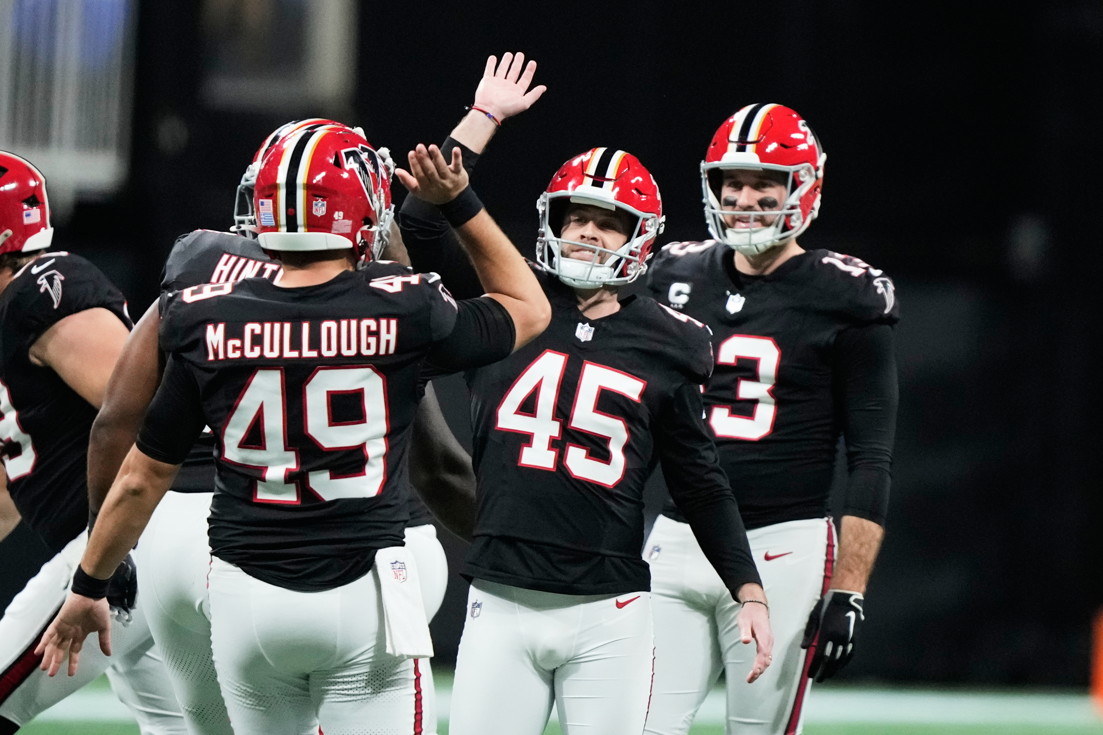 Atlanta Falcons place kicker Zane Gonzalez (45) celebrates his field goal in the second half of an NFL football game against the Los Angeles Rams, Monday, Dec. 29, 2025, in Atlanta.