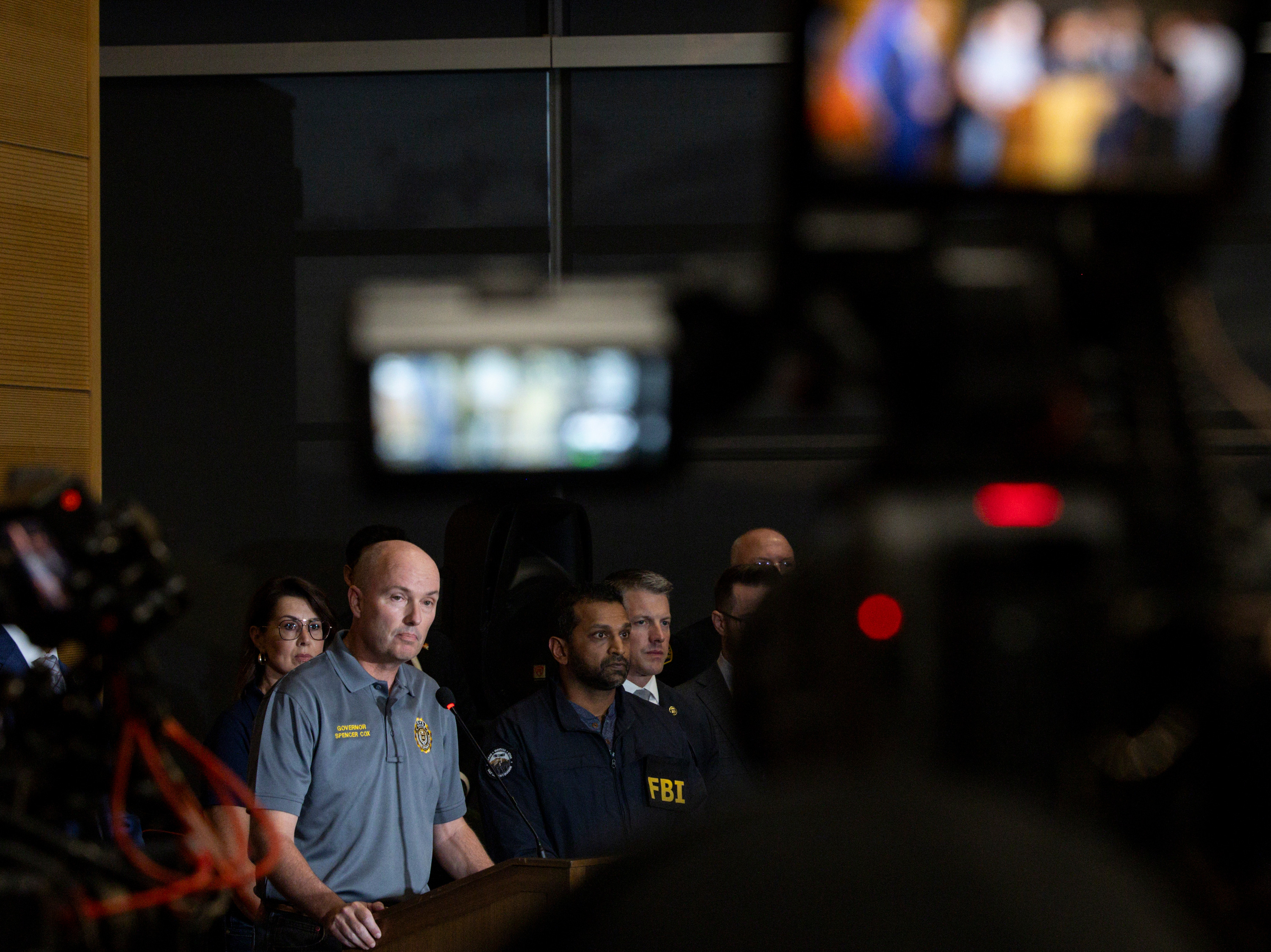Utah Gov. Spencer Cox speaks during a press conference while joined by Beau Mason, commissioner of the Utah Department of Public Safety, FBI Director Kash Patel, and others about the shooting death of Charlie Kirk at Utah Valley University in Orem on Sept. 11.