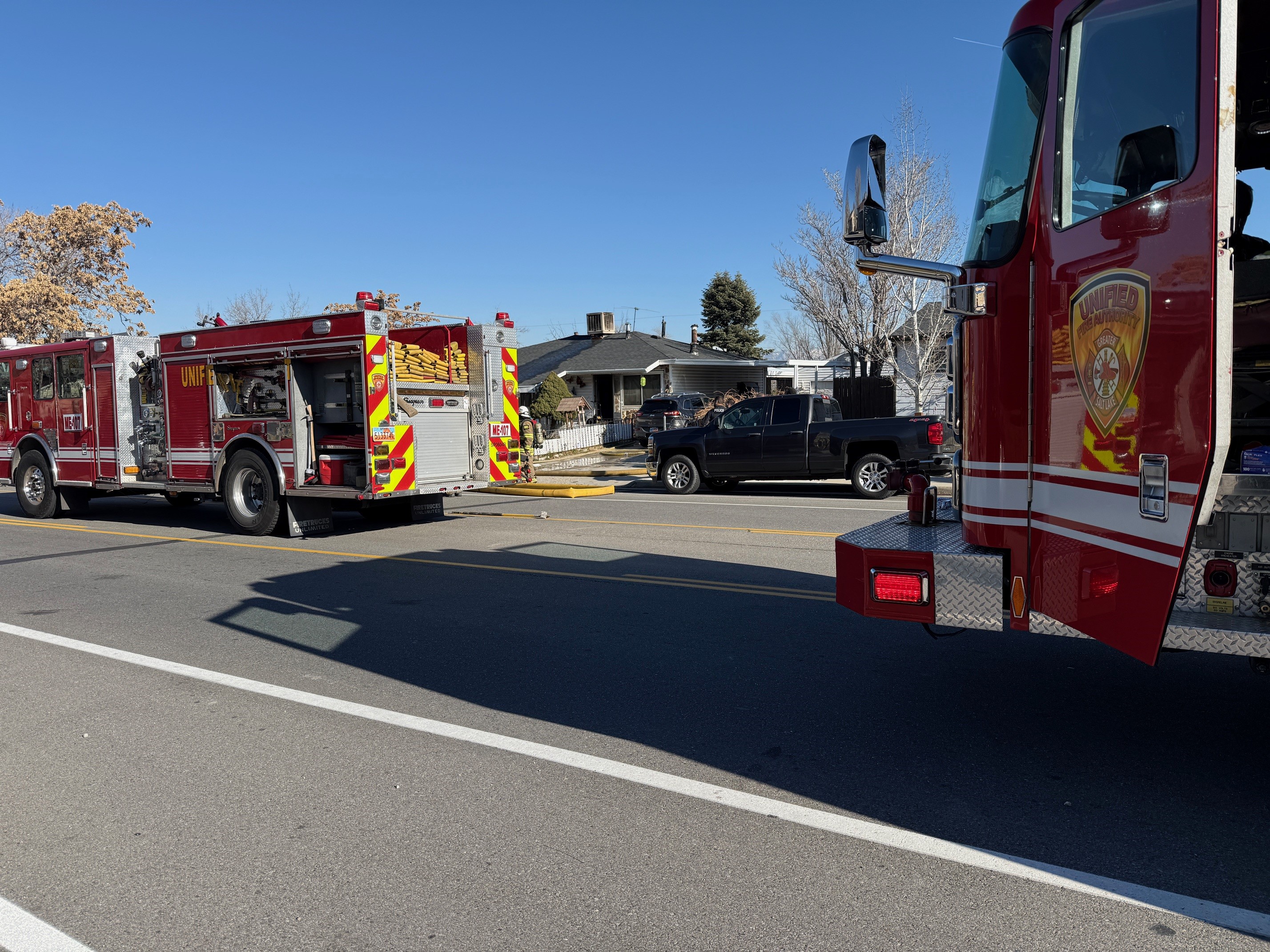 Crews respond to a house fire in Kearns on Tuesday, that left one dog dead. Fire officials said the home is significantly damaged and uninhabitable.
