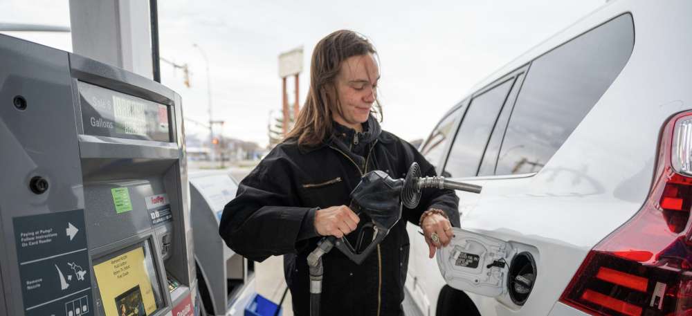 Which residents pay more at the pump due to gas taxes?
