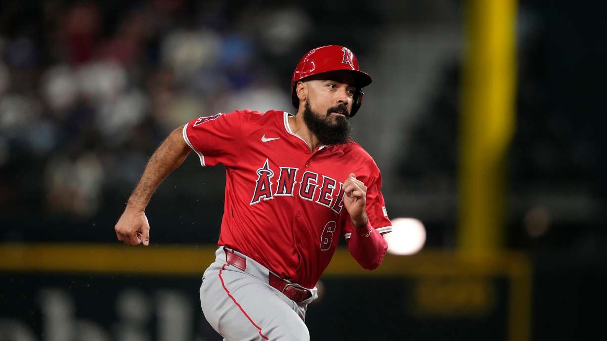 FILE - Los Angeles Angels' Anthony Rendon sprints to third during a baseball game against the Texas Rangers, Sept. 6, 2024, in Arlington, Texas.