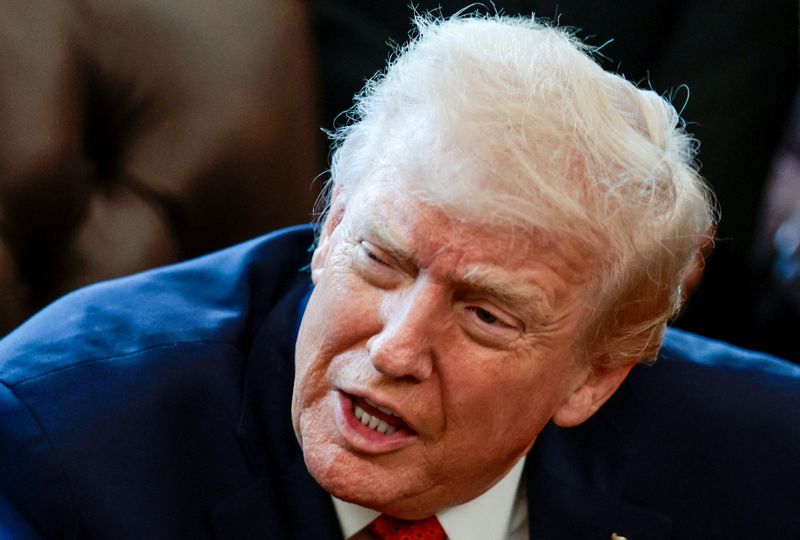 President Donald Trump speaks in the Oval Office as he signs an executive order, at the White House in Washington, Dec. 18, 2025. Trump on Friday threatened Iran with military action if it opened fire on protestors.