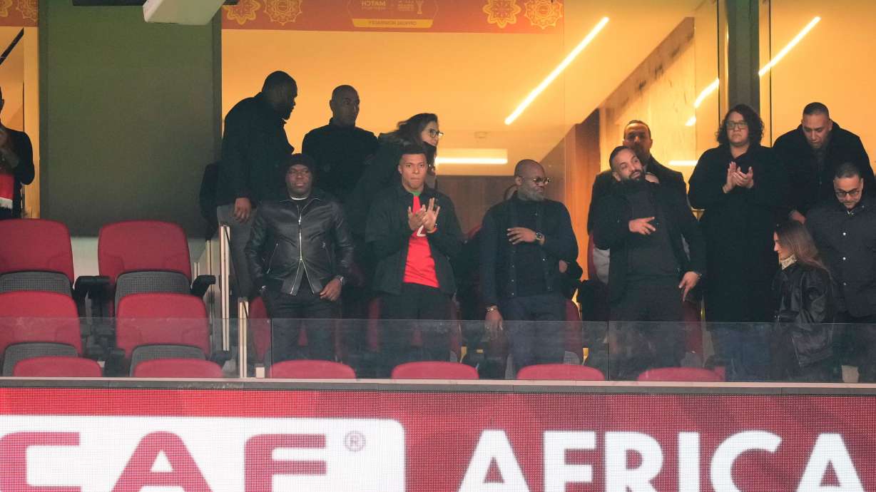 French forward Kylian Mbappé, centre, attends the African Cup of Nations Group A soccer match between Morocco and Mali in Rabat, Friday, Morocco 26, 2025.