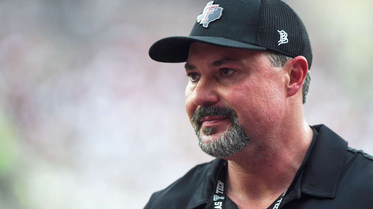 FILE - Cody Campbell walks on the field before a NCAA college football game between Texas Tech and Oregon State, Sept. 13, 2025, in Lubbock, Texas.