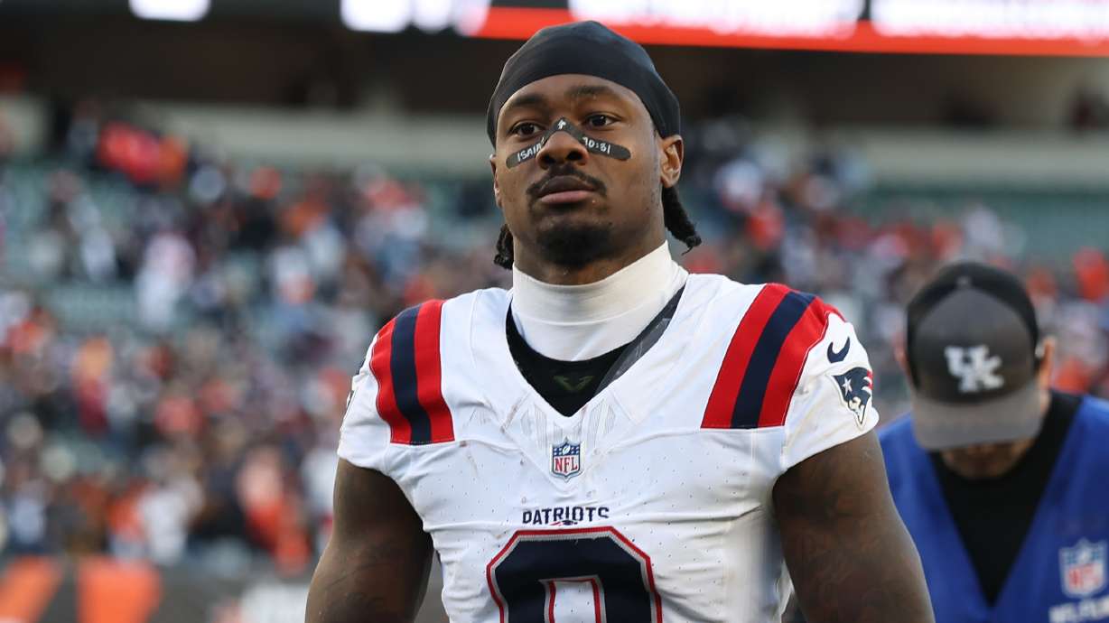 FILE - New England Patriots wide receiver Stefon Diggs (8) leaves the field following an NFL football game against the Cincinnati Bengals, Sunday, Nov 23, 2025, in Cincinnati, Ohio.