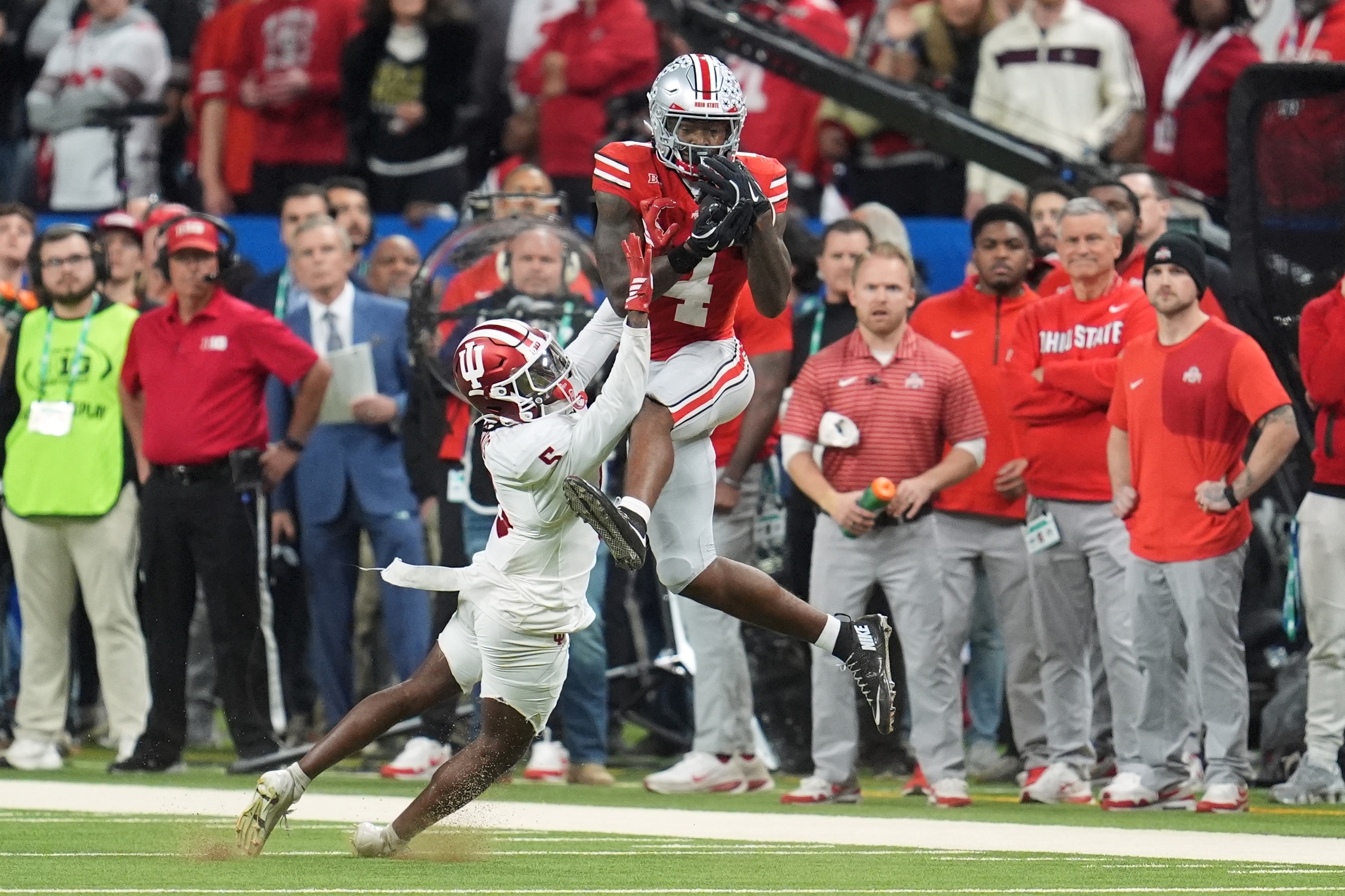 Miami beats defending national champ Ohio State 24-14 in the CFP quarterfinal at Cotton Bowl