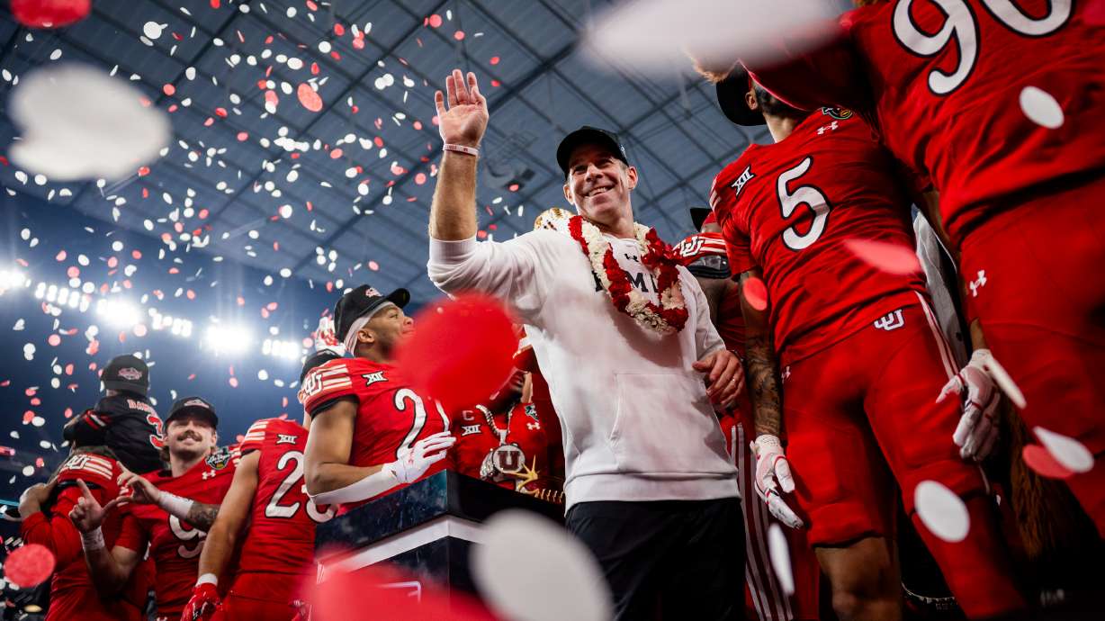 Utah Utes head coach Morgan Scalley and the team celebrate after receiving their trophy for winning the Las Vegas Bowl against the Nebraska Cornhuskers at Allegiant Stadium in Las Vegas on Wednesday, Dec. 31, 2025.
