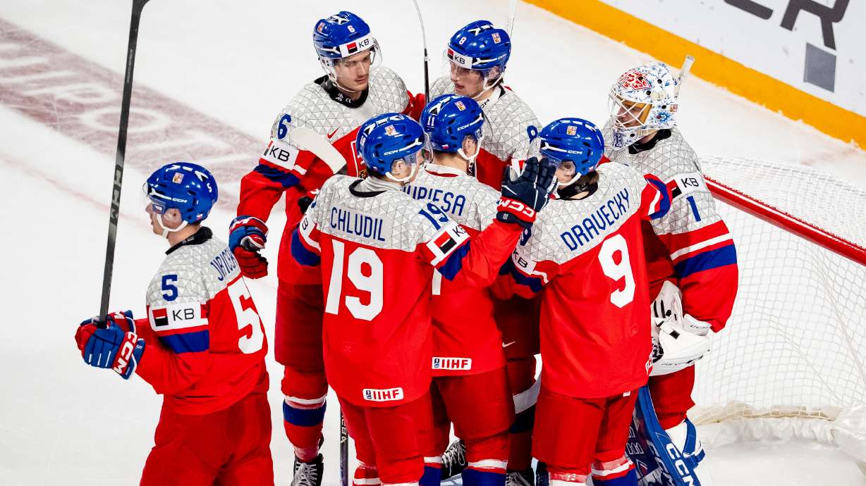 Team Czechia celebrates after defeating Latvia in IIHF World Junior Championship hockey action in Minneapolis on Wednesday, Dec. 31, 2025.