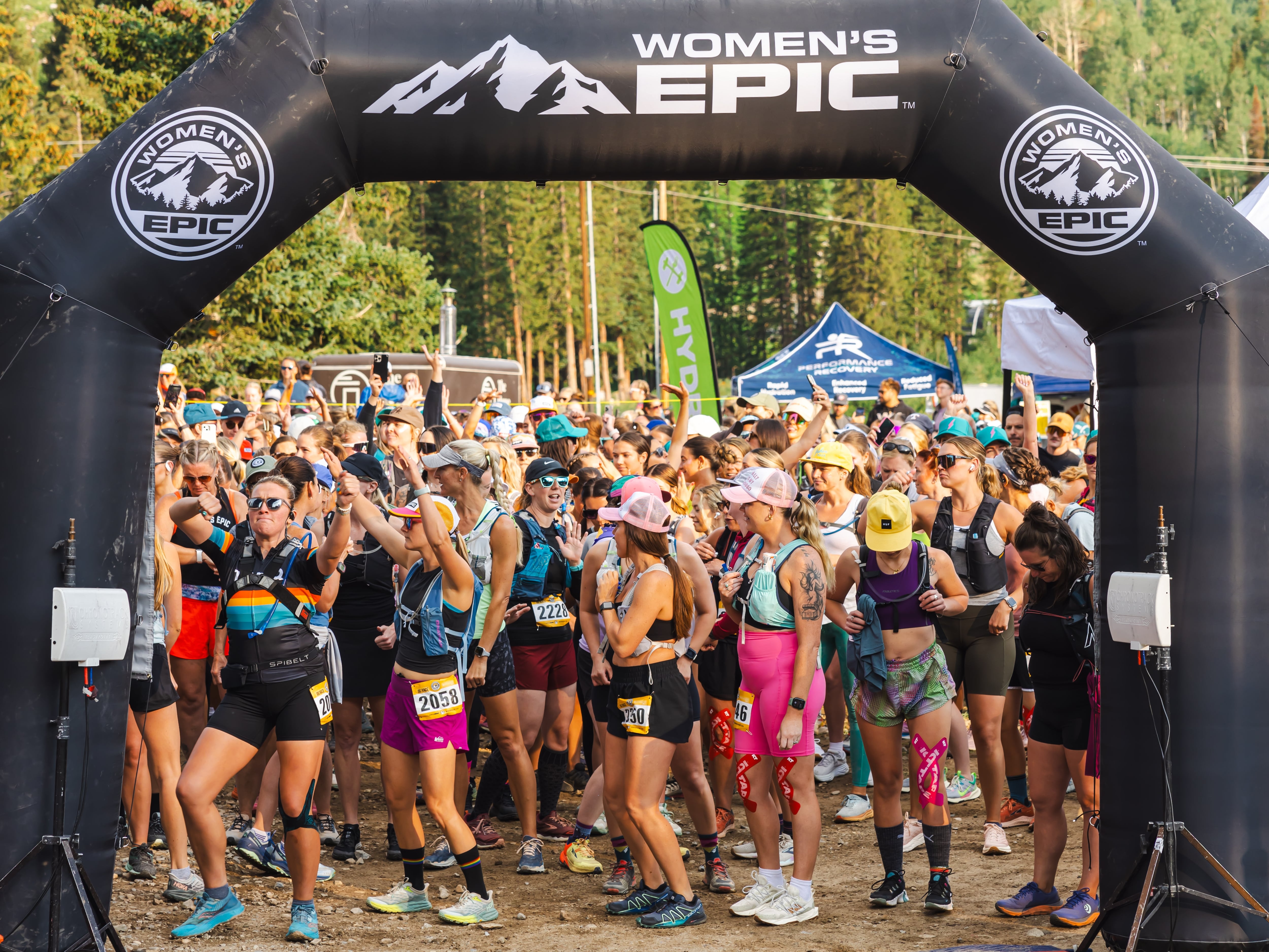 Runners wait at the start line for the Women's Epic Race held at Brighton Ski Resort on July 26.