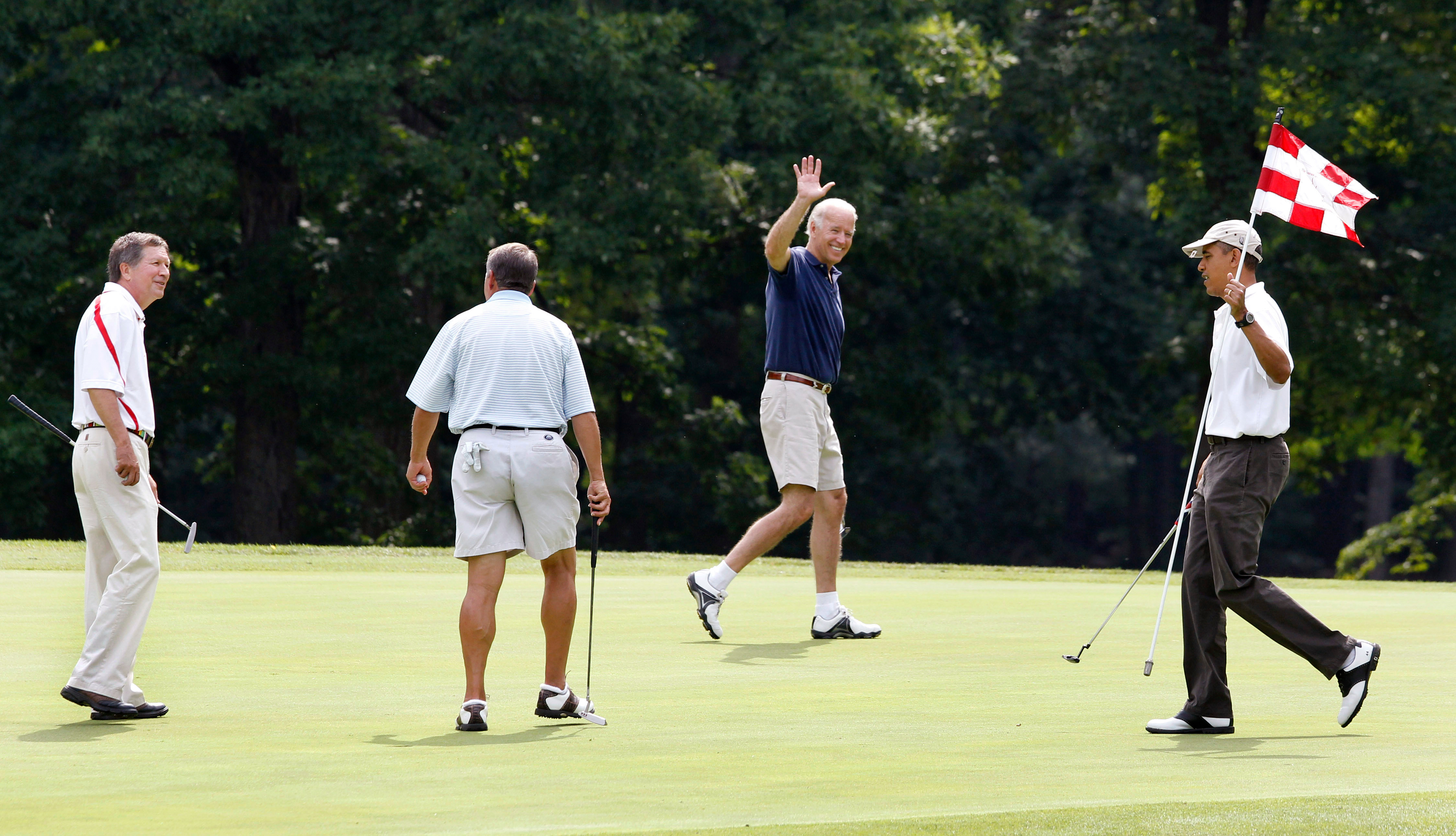 FILE - President Barack Obama, from right, Vice President Joe Biden, House Speaker John Boehner, R-Ohio, and Ohio Gov. John Kasich walk on the first green during a round of golf at Andrews Air Force Base, Md., June 18, 2011.