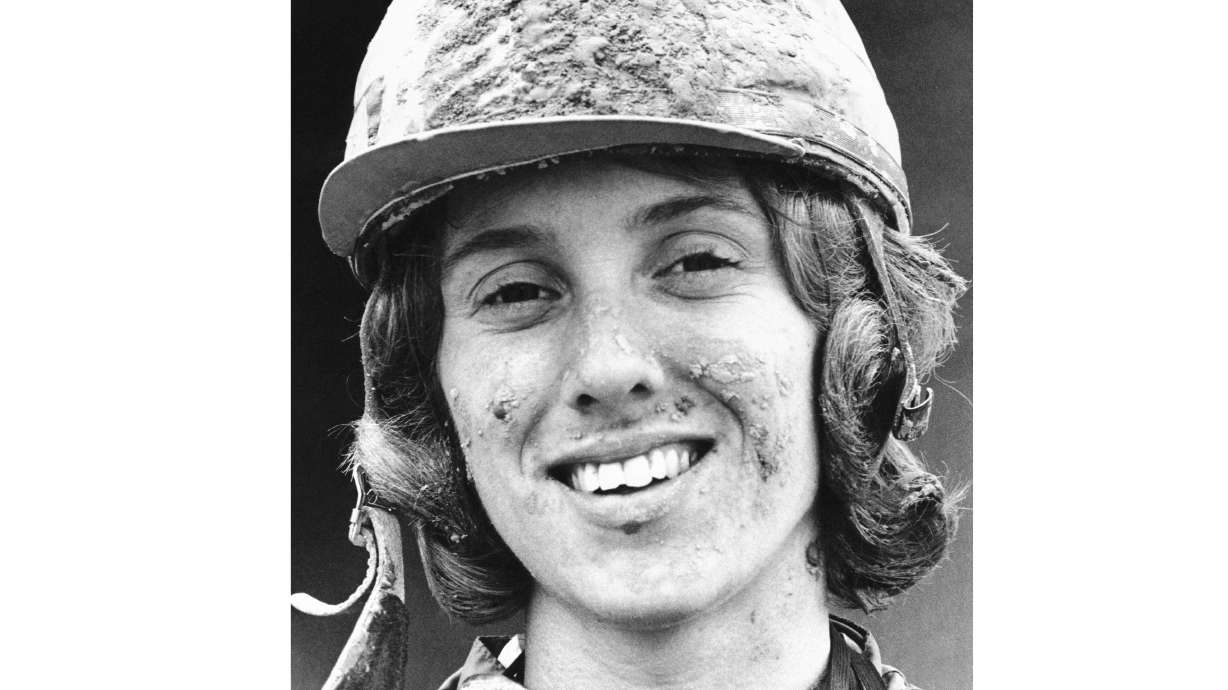 FILE - Jockey Diane Crump sports a mud pack on her cap and face after winning a Kentucky Derby race riding Right Sean, in Louisville, Kentucky, May 2, 1970. Crump, who in 1969 became the first woman to ride professionally in a horse race and a year later became the first female jockey in the Kentucky Derby, died Thursday, Jan. 1, 2026. She was 77.